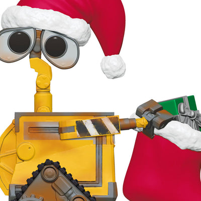 Wall-E Christmas ornament wearing Santa hat and holding red holiday stocking with a gift