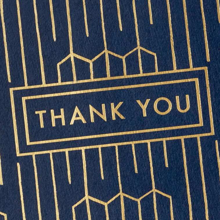 Navy blue thank-you cards with gold foil geometric lines and matching envelopes in kraft box.
