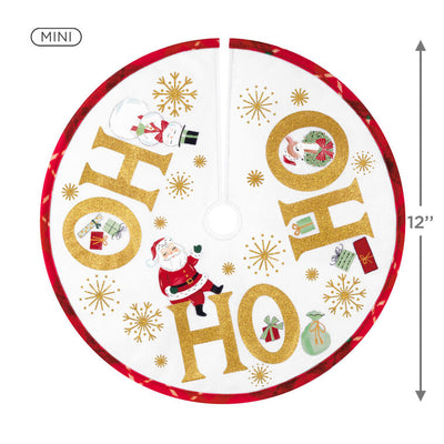 Mini round tree skirt with Santa, snowman, reindeer, gold snowflakes, and red plaid trim, designed to fit small tabletop Christmas trees.