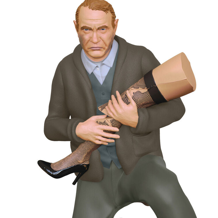Hallmark Keepsake ornament of Old Man Parker kneeling and cradling broken leg lamp, A Christmas Story movie scene