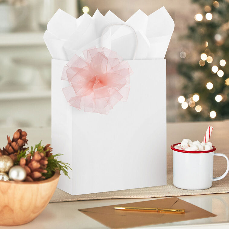 Hallmark pink sheer ribbon gift bow with satin trim, featuring 21 loops and a soft, fluffy appearance.