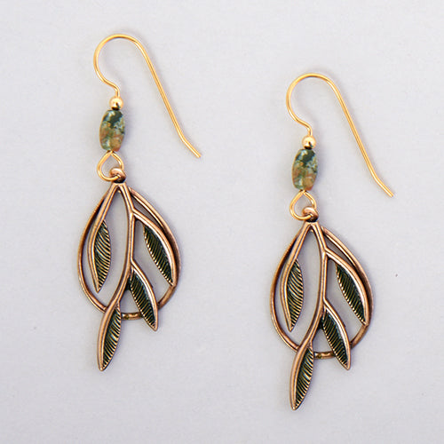 Gold-tone open teardrop earrings with green branch and green barrel bead accent.
