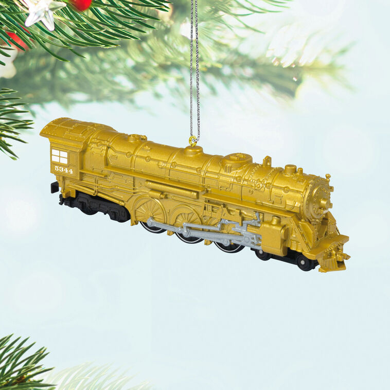 Lionel Trains New York Central 700E Hudson gold metal Christmas ornament by Hallmark Keepsake, die-cast steam engine with shiny metallic finish.
