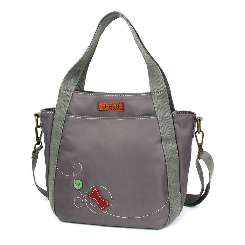 Venture Mini Carryall Pawprint Chala Pal design with antique brass embellishments, RFID credit card slots, dual-sided design, and adjustable shoulder straps.