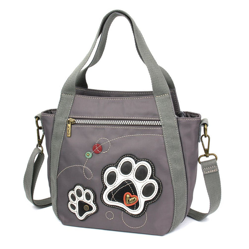 Venture Mini Carryall Pawprint Chala Pal design with antique brass embellishments, RFID credit card slots, dual-sided design, and adjustable shoulder straps.