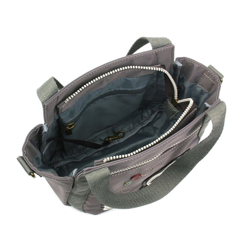 Venture Mini Carryall Pawprint Chala Pal design with antique brass embellishments, RFID credit card slots, dual-sided design, and adjustable shoulder straps.