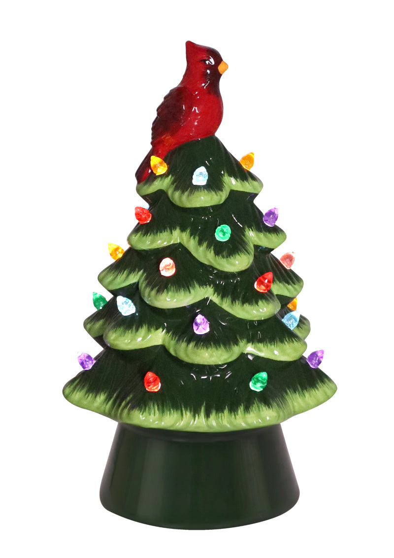 Glossy green ceramic LED Christmas tree with multicolor lights and red cardinal bird topper.