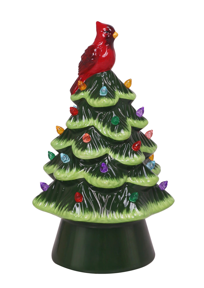 Glossy green ceramic LED Christmas tree with multicolor lights and red cardinal bird topper.