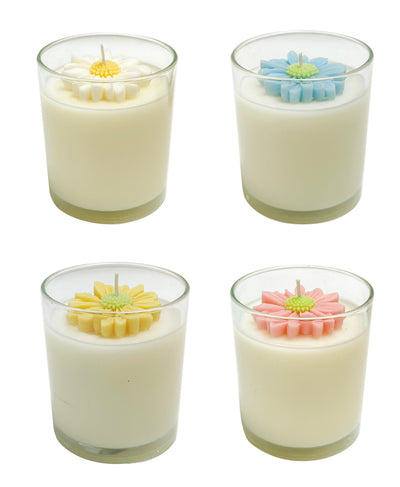 Opportunities 10 oz daisy candle in floral container, featuring soft fragrance and decorative daisy-themed design.