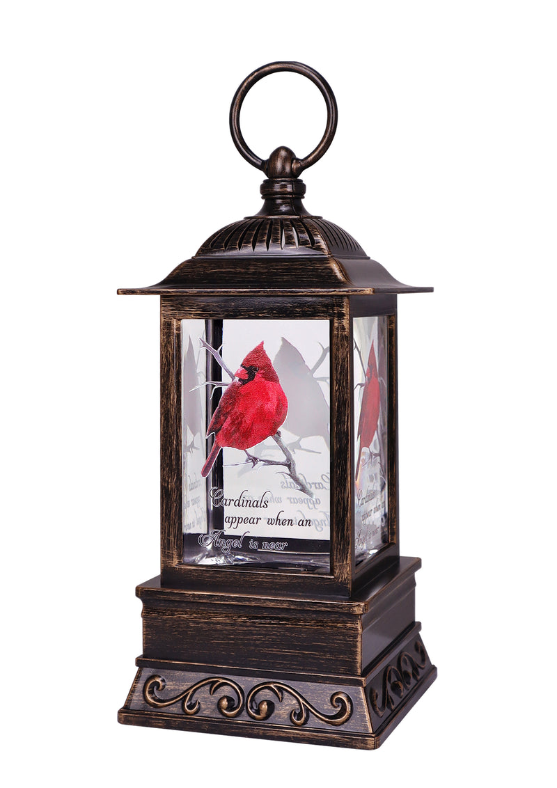 Bronze lantern with cardinal perched on branch, bereavement quote, glitter, and soft LED light.
