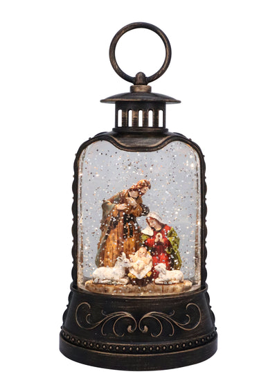 Holy Family nativity scene inside bronze glitter lantern with swirling snow.