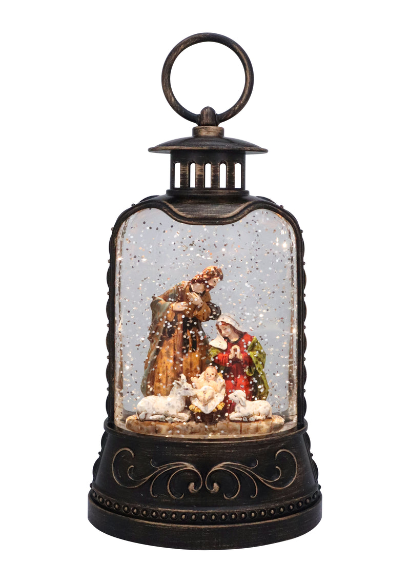 Holy Family nativity scene inside bronze glitter lantern with swirling snow.