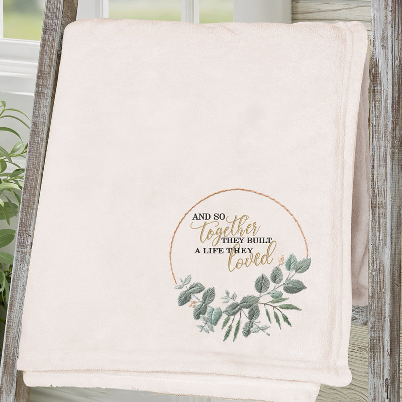 Cozy beige fleece blanket with heartfelt quote and simple design