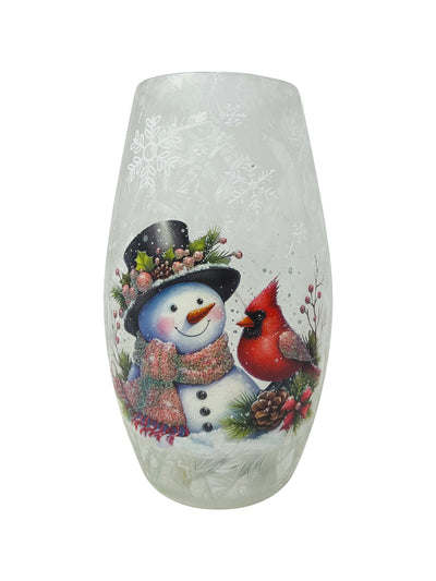 Frosted crackle glass vase with cheerful snowman and red cardinal design, softly lit by built-in LED.
