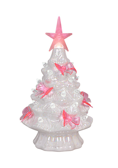 White iridescent ceramic Christmas tree with glowing LED light, topped with a pink star and soft pink bows.