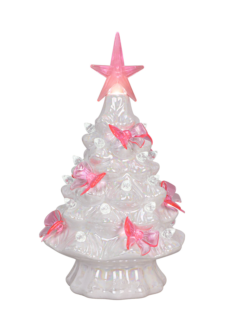 White iridescent ceramic Christmas tree with glowing LED light, topped with a pink star and soft pink bows.
