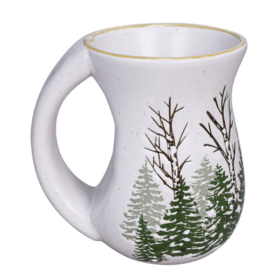 White ceramic mug with balsam and cedar tree artwork and a smiling snowman illustration, curved shape and handle.