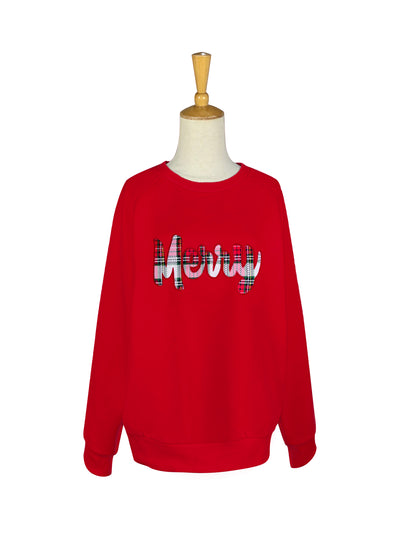 Bright red sweatshirt with white plaid “Merry” lettering across the chest, shown on mannequin.