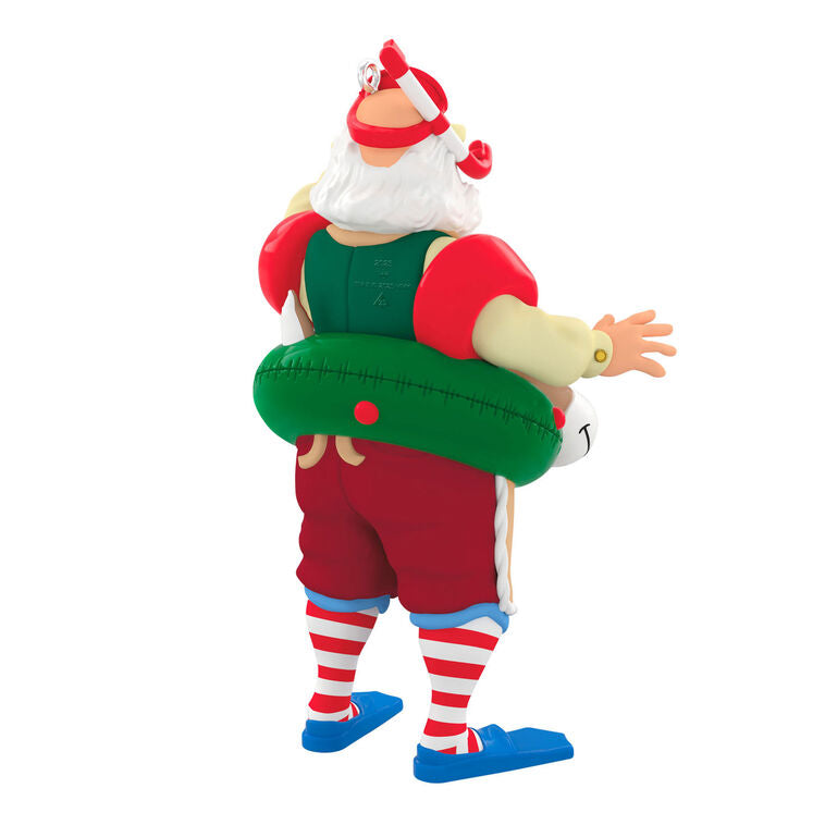 Santa in snorkel mask, arm floaties, and striped socks, with reindeer swim tube and toy boat marked 2025, Hallmark Keepsake ornament
