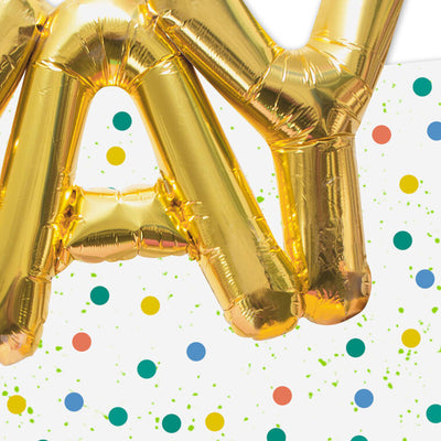 White note cards with gold balloon-style “YAY” lettering, confetti dots, and die-cut front, packaged in kraft wrap.
