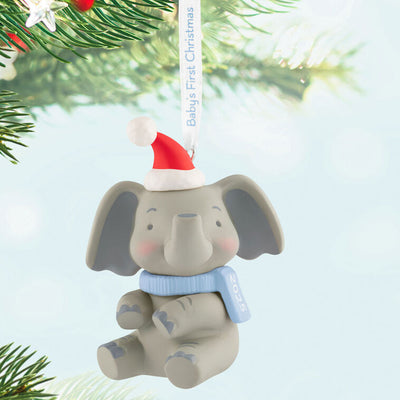 Gray elephant ornament with Santa hat and pink scarf, holding a 2025 baby girl’s first Christmas ribbon.