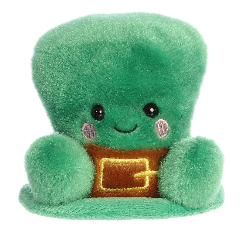 Finnigan Palm Pals plush leprechaun hat with green body, golden belt buckle, and cheerful smile—perfect for St. Patrick’s