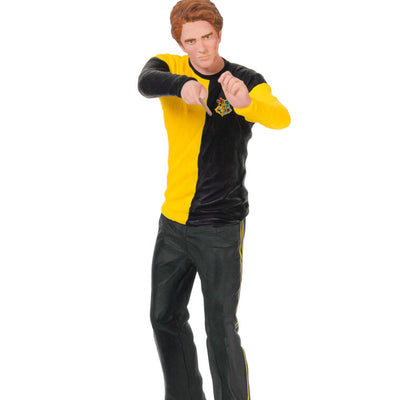Cedric Diggory in yellow and black Hufflepuff robes raising his wand in a Harry Potter Christmas tree ornament