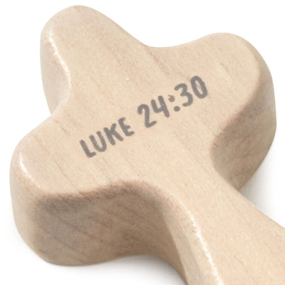 Hallmark light wood mini comfort cross with “1st Communion” and Luke 24:30 printed in gray lettering.