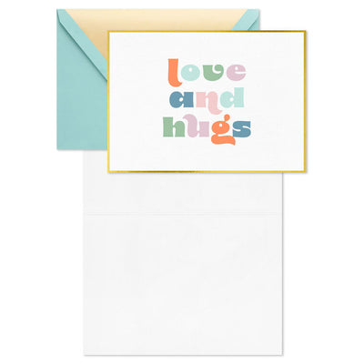 Pastel mod-style “Love and Hugs” blank note cards with gold foil frame on ivory paper, in kraft box.
