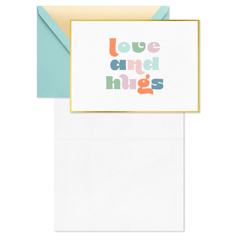 Pastel mod-style “Love and Hugs” blank note cards with gold foil frame on ivory paper, in kraft box.
