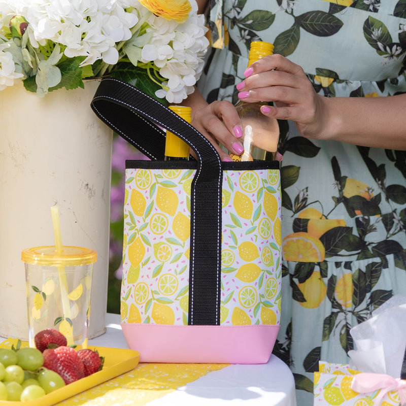 SCOUT Drinking Buddy wine tote in Melondramatic print, holds two bottles with padded divider, foam insulation, and reinforced base.