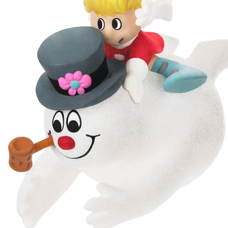 Frosty the Snowman ornament by Hallmark Keepsake featuring Frosty sliding down a snowy hill with Karen on his back from the classic holiday special.