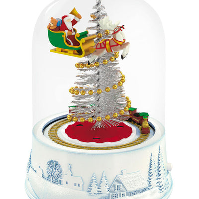 Santa sleigh and toy train under glass dome with lights and motion on snowy village base