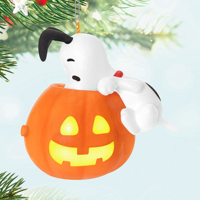 Snoopy Halloween ornament with glowing jack-o'-lantern, plays music and spooky sounds when button is pressed