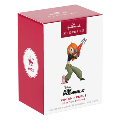 Kim Possible ornament in black top and green pants, holding grappling hook with Rufus the naked mole rat by her side.

