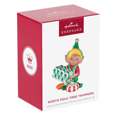 Hallmark Keepsake North Pole Tree Trimmers ornament—Santa’s elf holding old-fashioned ribbon candy, surrounded by hard candies, green hat and red suit
