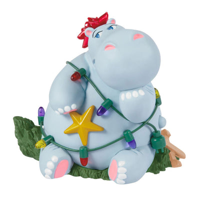 Hippopotamus Christmas ornament tangled in lights on a squished tree, plays holiday song, battery operated

