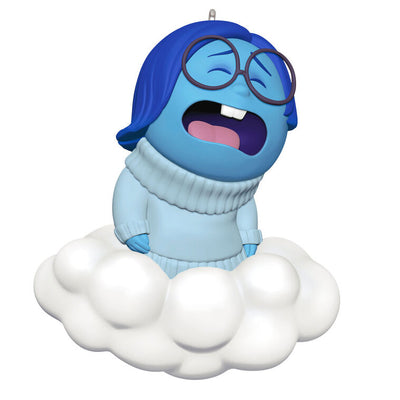 Hallmark Keepsake Inside Out 10th Anniversary Sadness ornament with Sadness sitting on a white cloud, Disney/Pixar Christmas decoration.