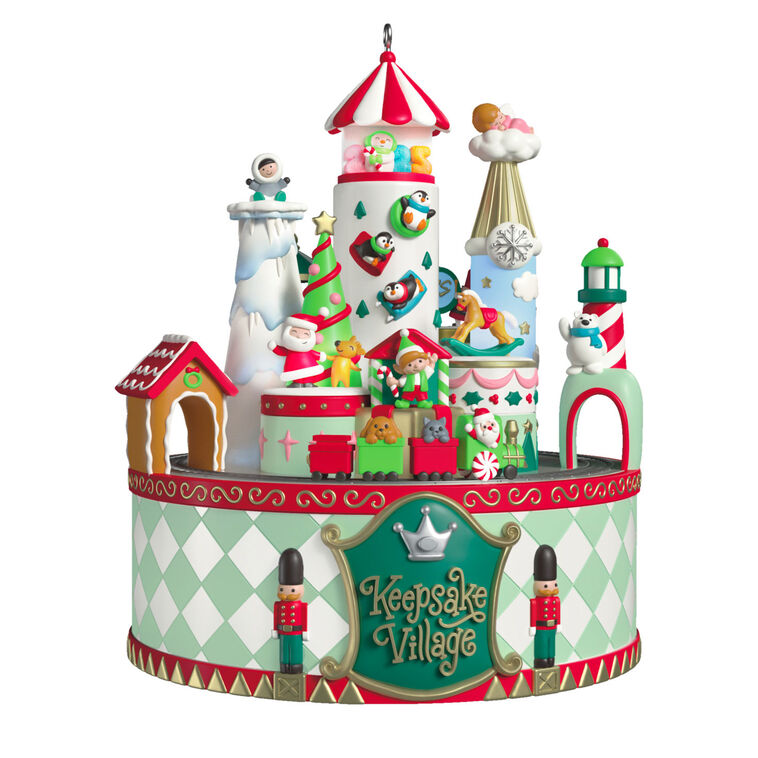 Musical Christmas village ornament with Santa, characters, spinning train, lights, and holiday carols, battery operated

