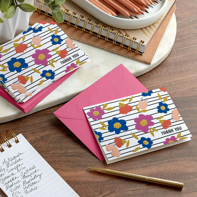 Thank you cards with bold poppies, butterflies, and black stripes on white background, includes 10 blank cards and pink-lined envelopes