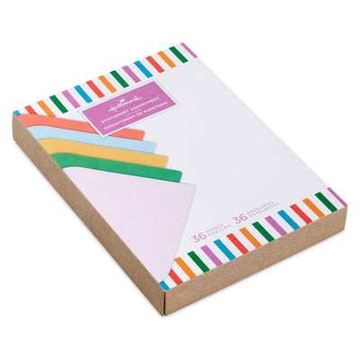 Stationery set with white sheets bordered in bright vertical stripes and colorful envelopes in pink, green, orange, rose, and aqua.
