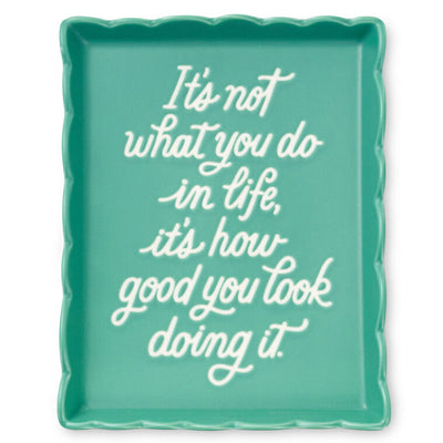 Teal Hallmark trinket tray with scalloped edge and message “It’s not what you do in life, it’s how good you look doing it.”