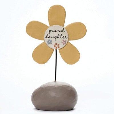 Blossom Bucket Bright Blessings Granddaughter Flower. Yellow flower on a rock with text "Granddaughter