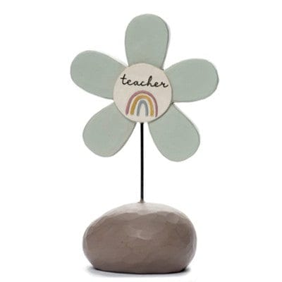 Blossom Bucket Teacher Flower Bright Blessings Figurine. Resin figurine of a flower with a face, on a stem shaped like a woman in a blue dress and white collar.
