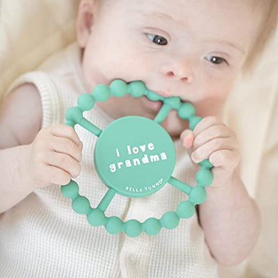 Round silicone baby teether with beaded texture and "I Love Gma" text, designed for safe teething relief.