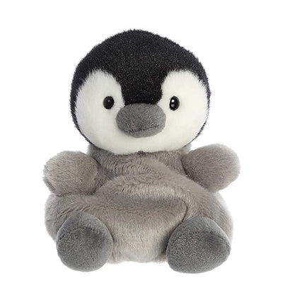 Gray and white plush penguin sitting on a white background