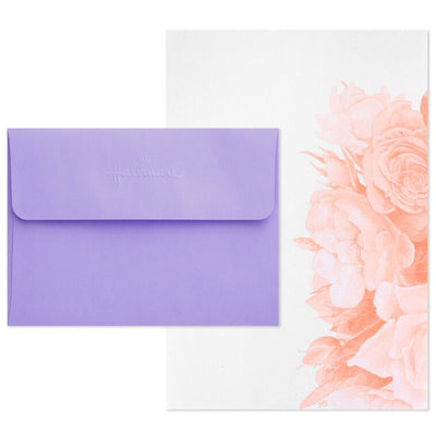 Lavender stationery set with butterfly and floral designs, 40 writing sheets and 20 envelopes in a magnetic storage folio.
