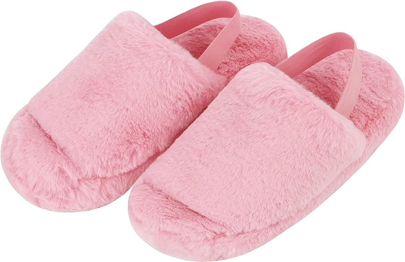 Pink fuzzy Snoozies slides with non-slip sole, cozy indoor slipper sandals for women.