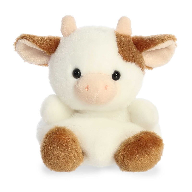 Caroline the brown cow Palm Pals plush with soft fur, white patches, and a bean-stuffed body sized perfectly for small hands.