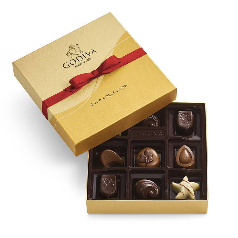 A gold Godiva gift box containing 9 premium chocolates from the Gold Collection, including praline, caramel, coffee, and fruit-filled pieces.

